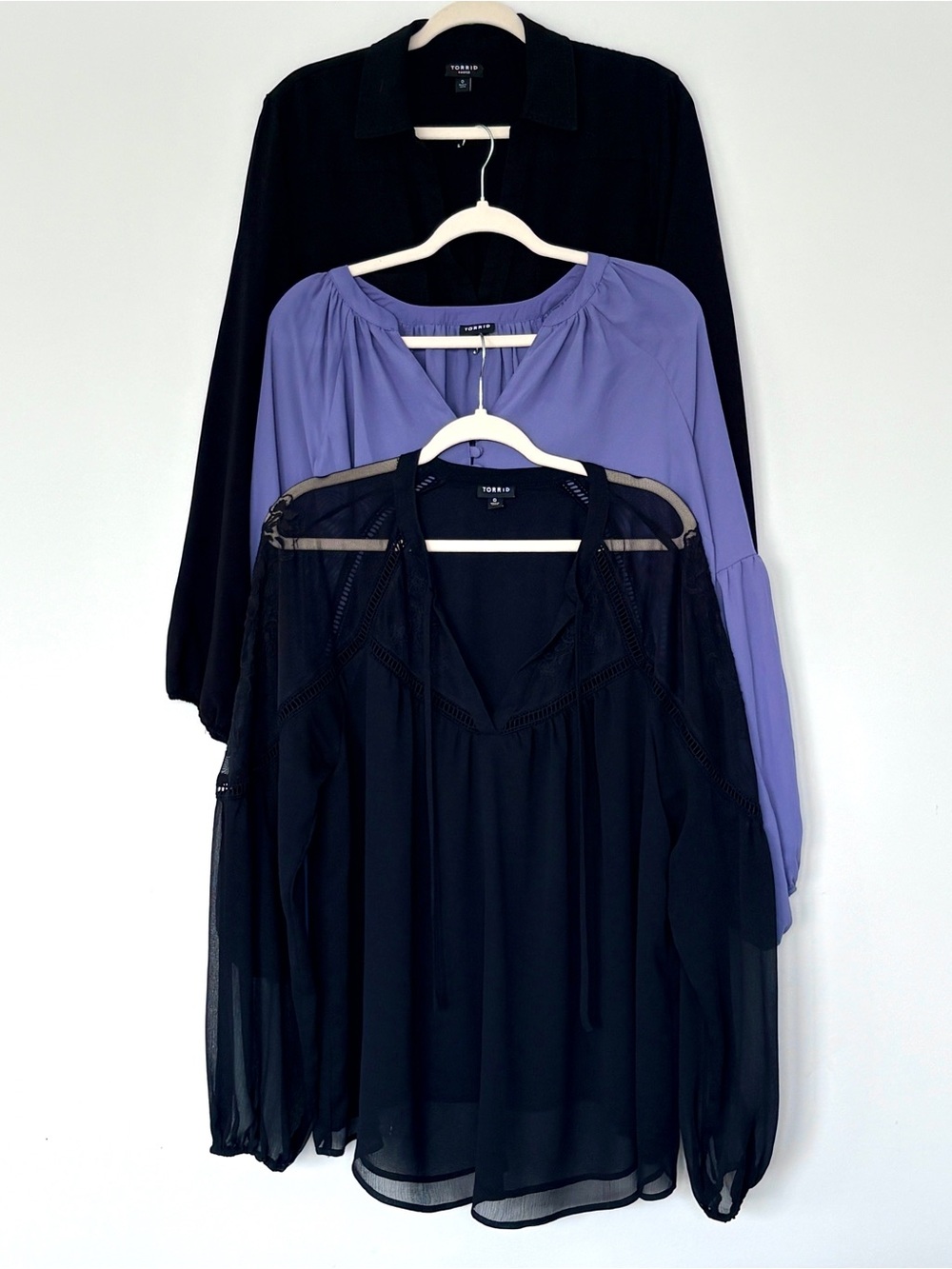 Torrid Blouses Set of three $39. All size 0